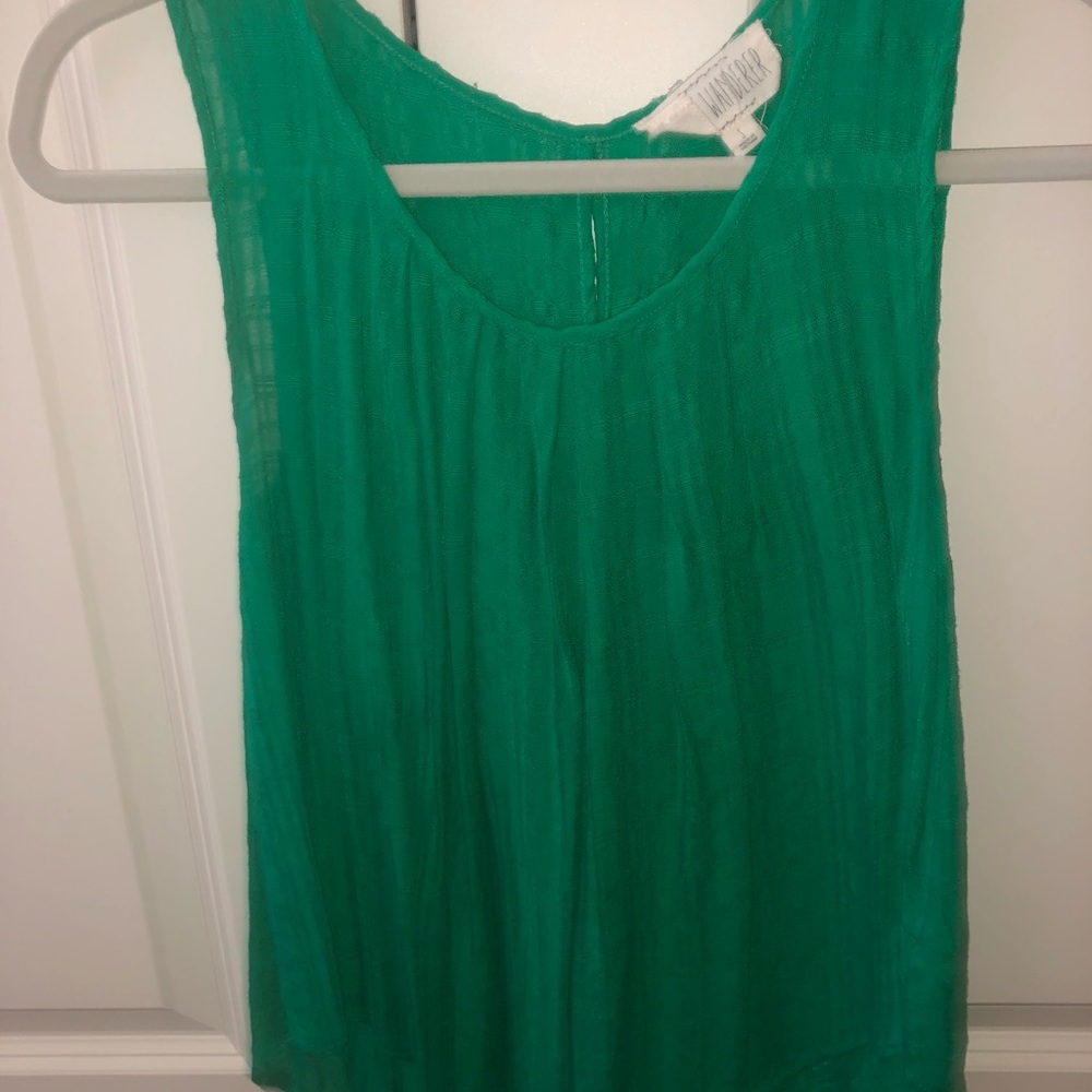 Green tank top with button detail.